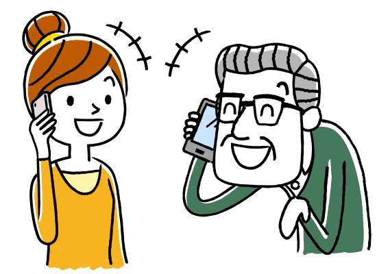 携帯電話で話をする若い女性と高齢の男性