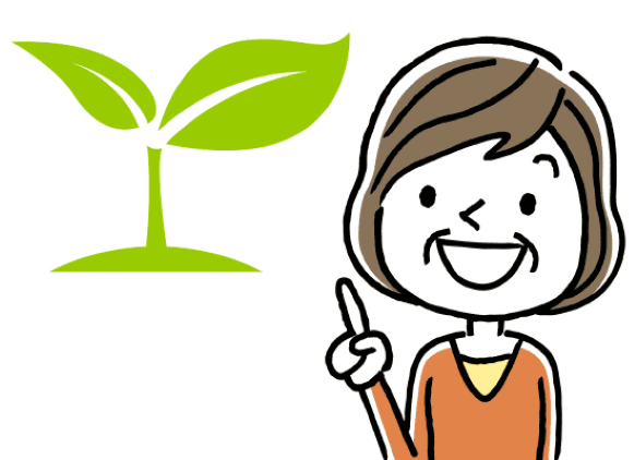 植物を指さして笑顔の高齢女性