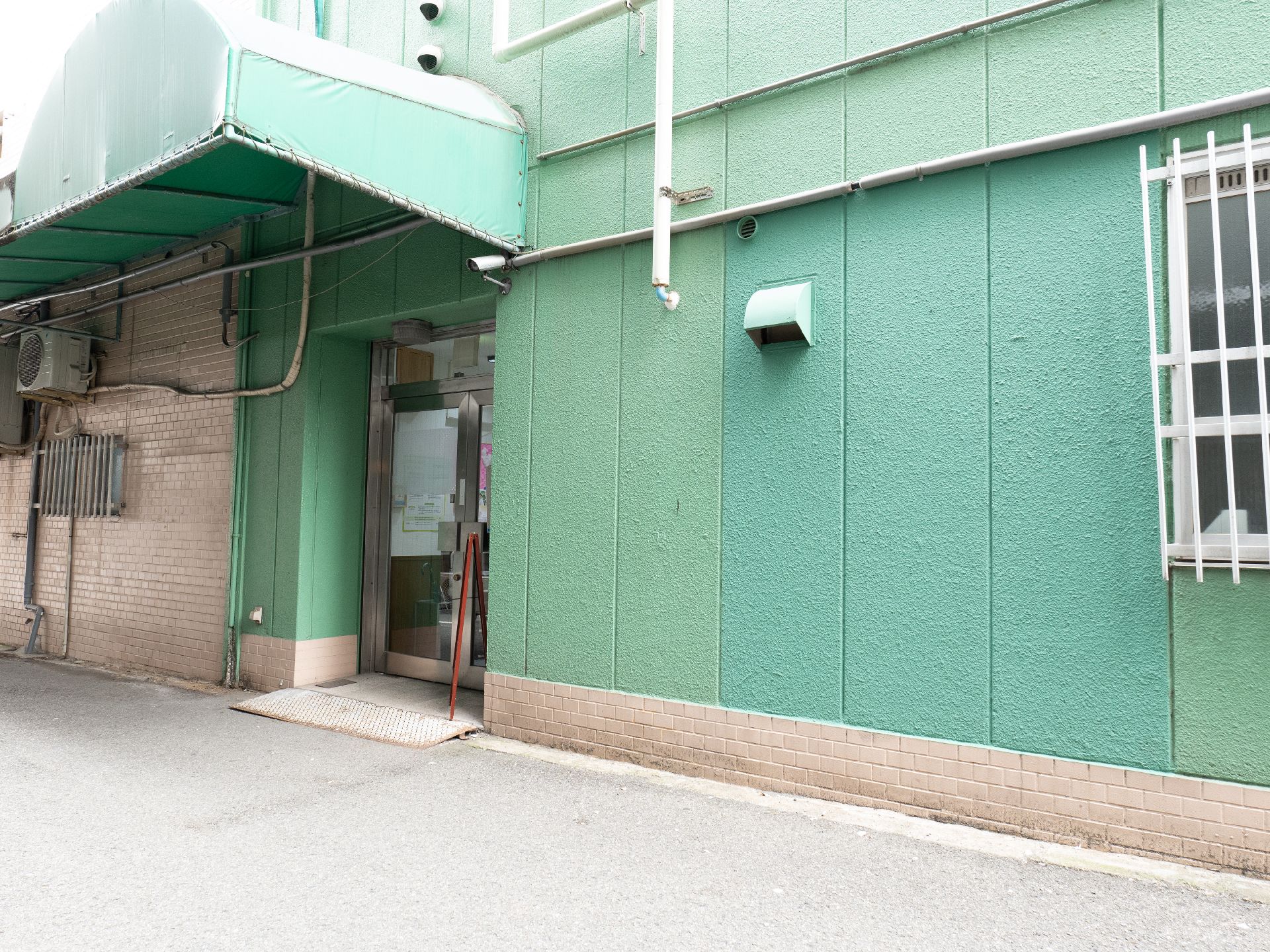 住宅型有料老人ホームのグリーンの建物