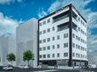 街角に立つ白い建物
